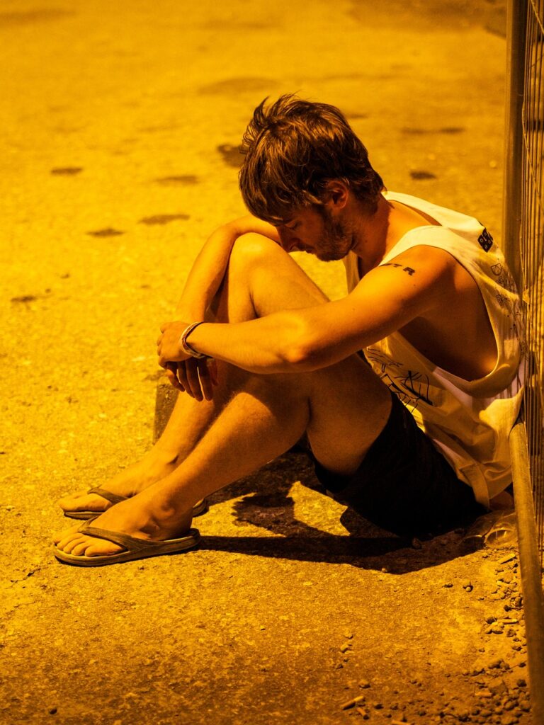 sad man on beach