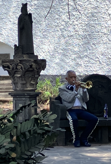 Mariachi musician warming up