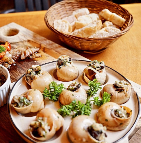 A plate of escargot at Le Bon Plan.