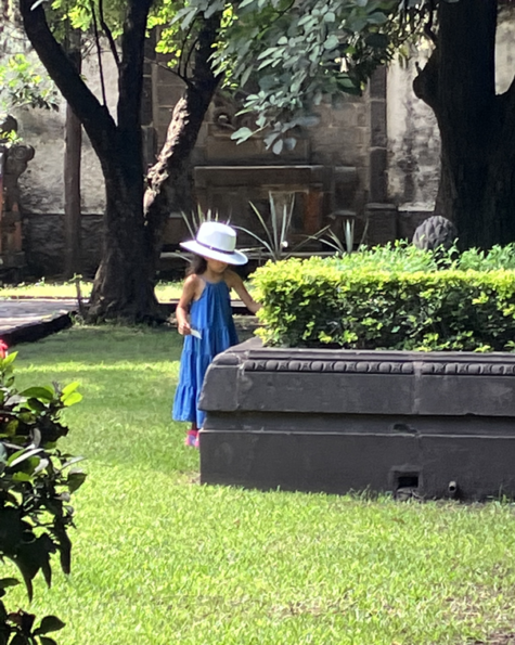 Girl in a Mexican garden.