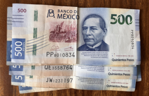 stack of $500 peso notes