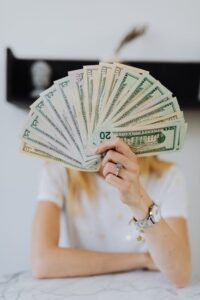 A lady enjoying a financial windfall