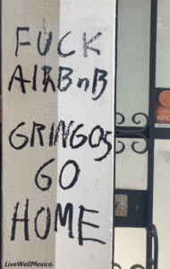Anti-Airbnb grafitti in CDMX.