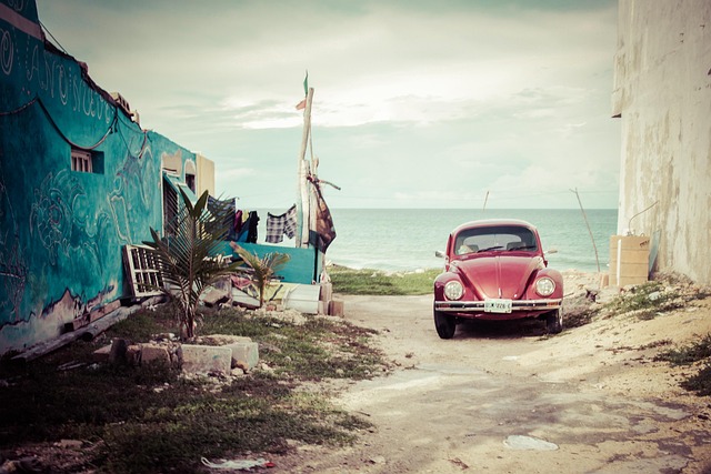 an old Volkswagen at the beach in Mexico